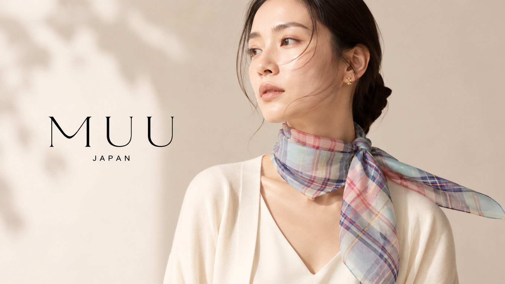 MUU scarf styled softly at the neck
